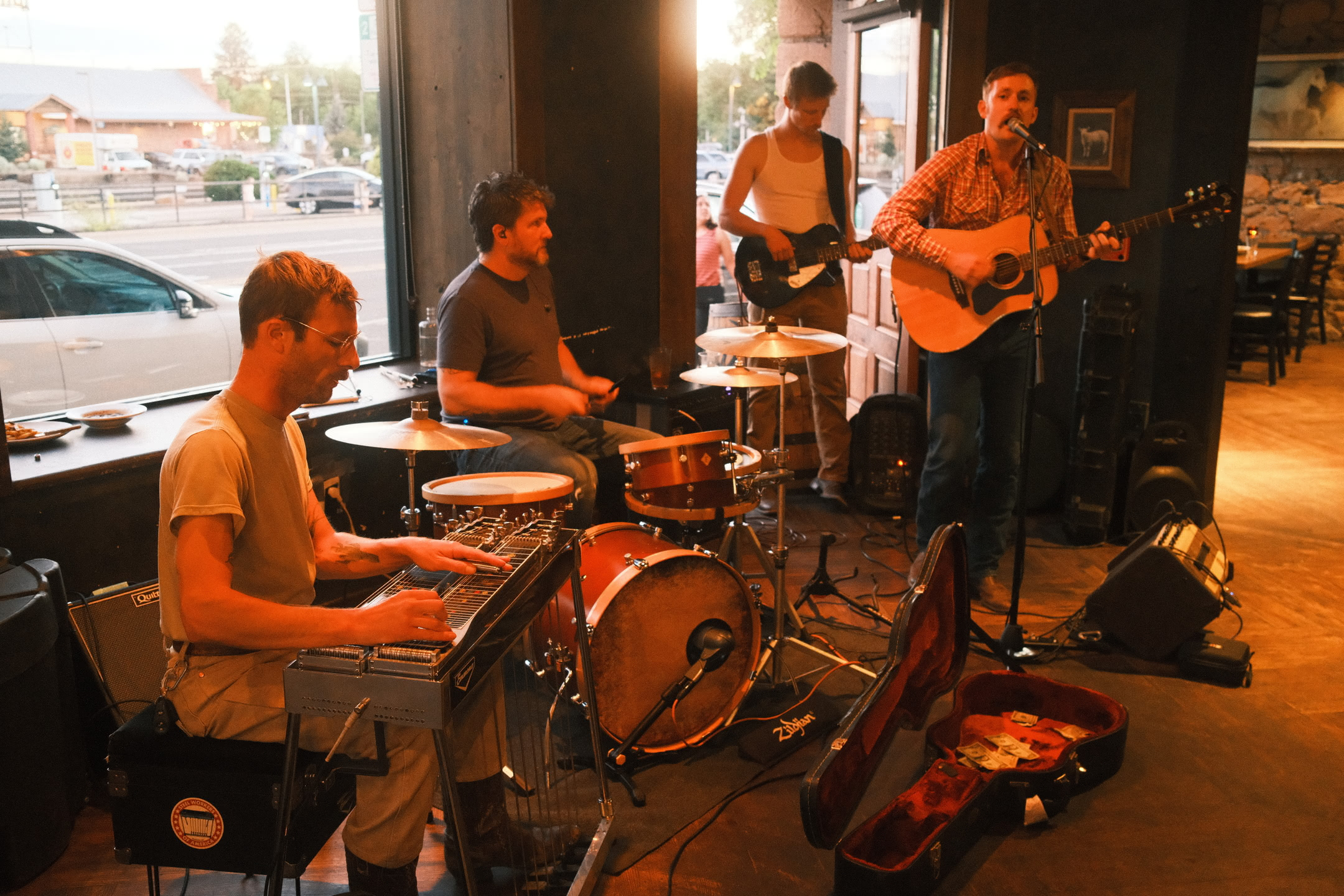 Live folk band in a restaurant putting on a wonderful show.